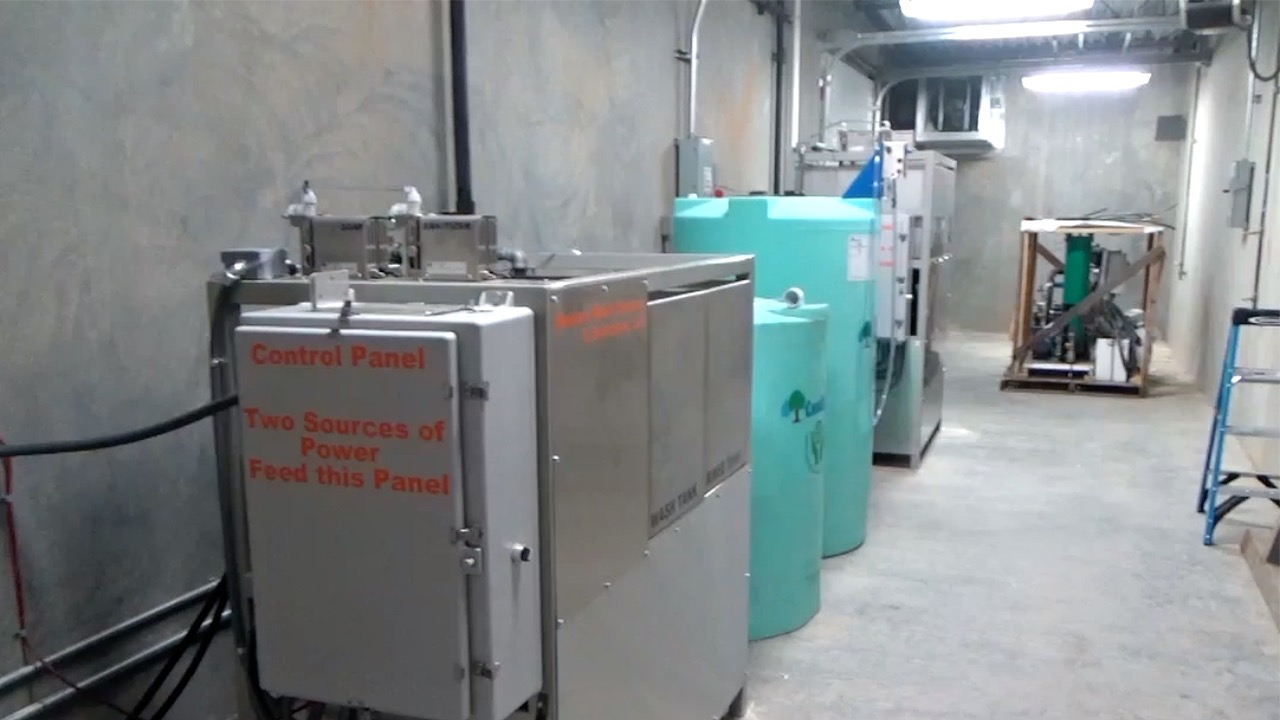 Trailer sanitization wash system chemical storage.