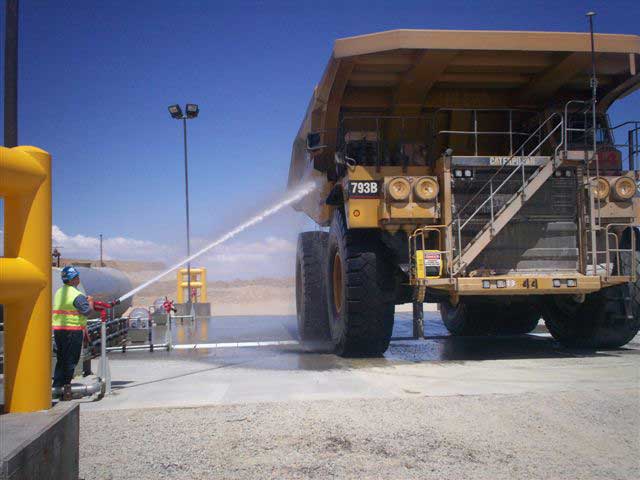 A mining vehicle being washed.